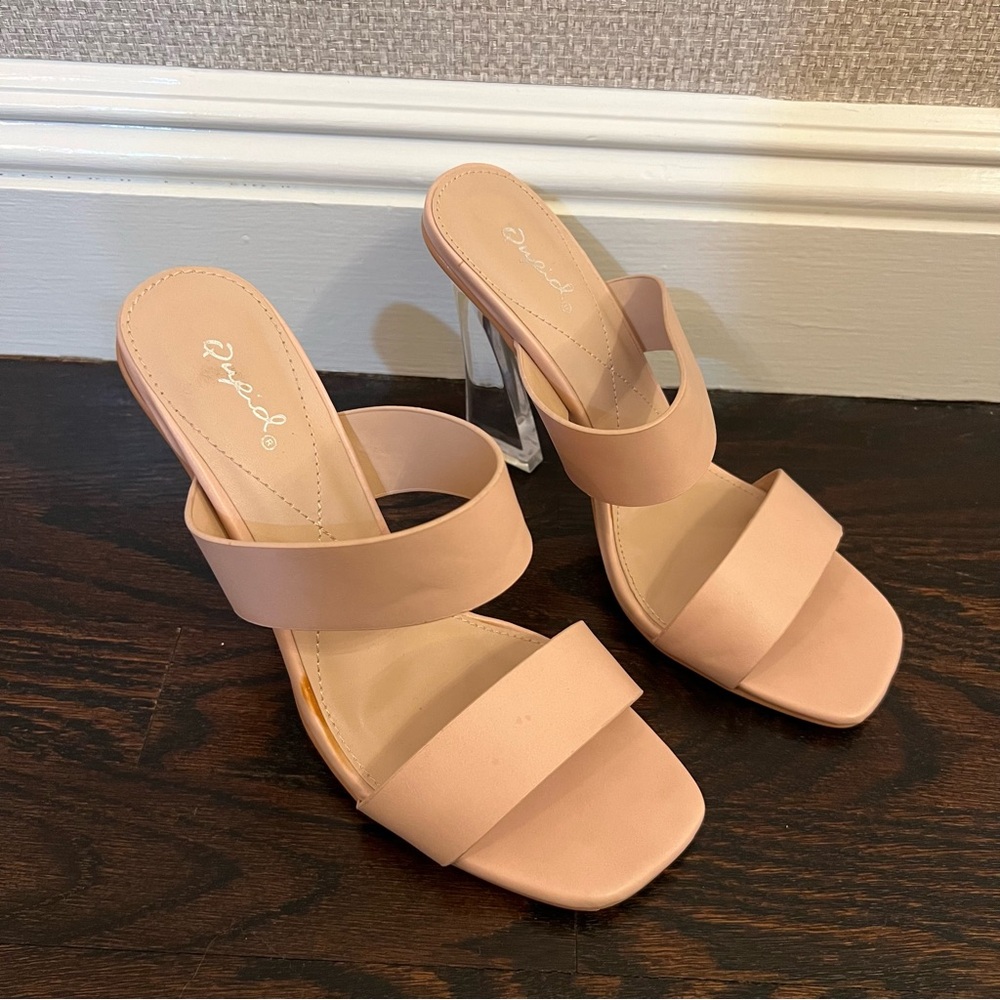 Nude straps and clear heel, never worn.